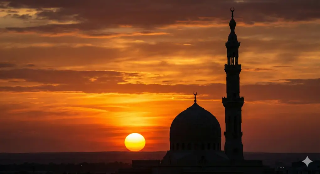 Siluet masjid dengan latar belakang matahari terbit sempurna (syuruq), menandakan waktu sholat subuh sudah habis.