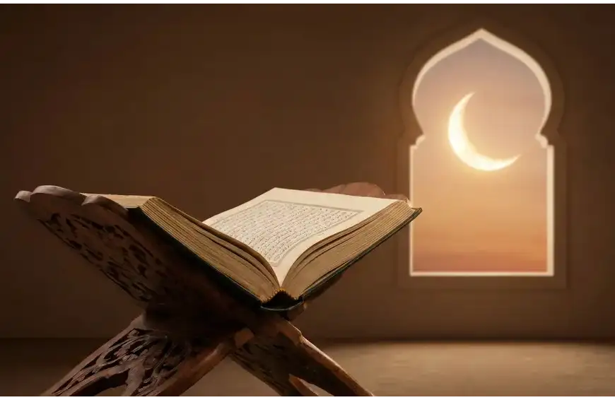 An open antique Islamic manuscript resting on a carved wooden bookstand, with an arched mosque window in the background revealing a glowing crescent moon at twilight.
