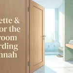 Aesthetic, partly-open wooden bathroom door with the text overlay "Etiquette & Dua for the Bathroom According to Sunnah", showing a clean wastafel and wudhu area inside.