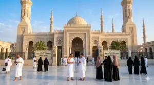 Shafi'i School of Jurisprudence: The Complete Guide to Islamic Law, Prayers, and Tasawuf 19 Hajj and Umrah pilgrims preparing and wearing ihram garments at the Miqat Mosque of Dzul Hulaifah in the morning.