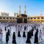 Hajj and Umrah pilgrims performing the Tawaf ritual around the Kaaba in Masjid al-Haram wearing ihram and modest hijab.