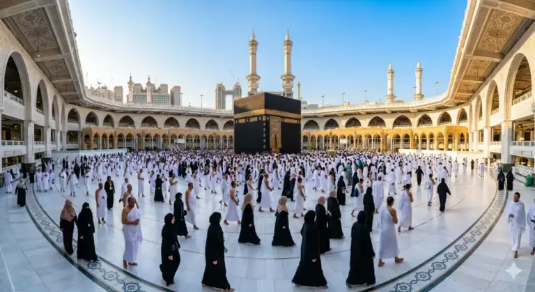 Shafi'i School of Jurisprudence: The Complete Guide to Islamic Law, Prayers, and Tasawuf 1 Hajj and Umrah pilgrims performing the Tawaf ritual around the Kaaba in Masjid al-Haram wearing ihram and modest hijab.